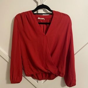 Orange draped front blouse